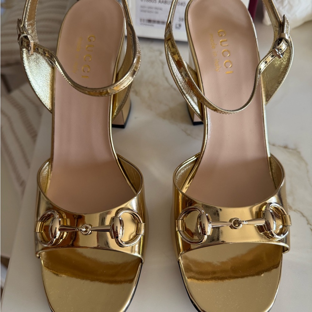 Gucci

Lady Horsebit Metallic Leather Sandals size 8